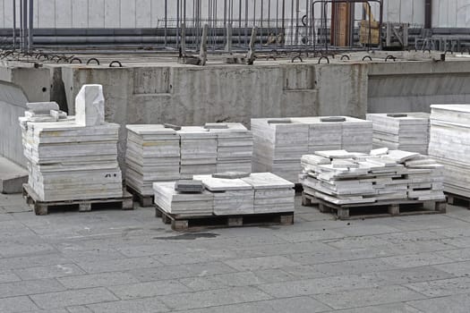 Marble tiles on pallets at construction site