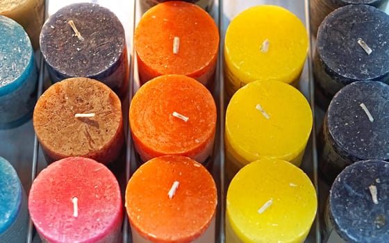 Scented candles in different colours