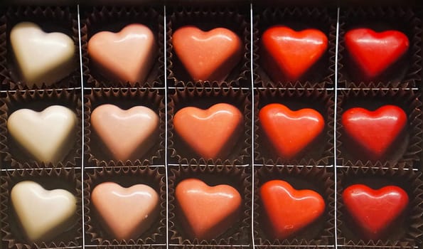 Heart shape chocolate pralines in the box