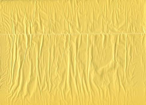 front view closeup of wrinkled yellow plastic bag pattern texture background