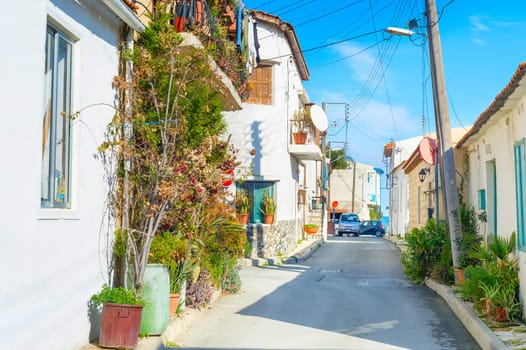LARNACA, CYPRUS - FEB 17, 2019: Empty street leading to the sea in Larnaca, Cyprus