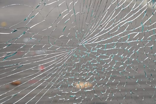 Broken window and cracked glass damage