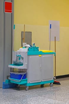 Janiorial cart loaded with cleaning equipment