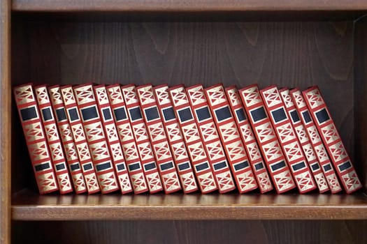 Books at wooden book shelf
