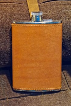 Hip flask covered with brown leather