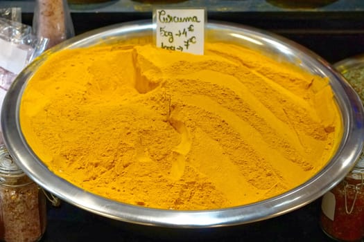 Big pile of curcurma spice at french market