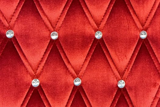 Red upholstery pattern with zircons decoration