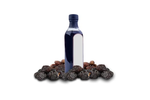Dates Vinegar bottle and Dates fruit on white background. Copy space concept