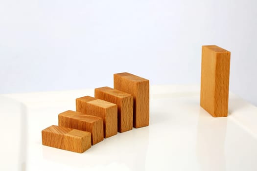 ascending diagram with wooden blocks