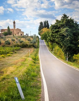 Small road through the countryside of Tuscany, Italy