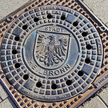 Heilbronn, Baden-Württemberg / Germany - 23 06 2020: Manhole cover with coat of arms in Heilbronn