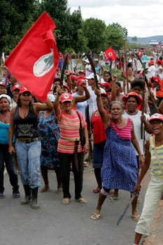 eunapolis, bahia / brazil - march 1, 29011: women from the Landless Movement - MST - are seen during a protest blocking the BR 101 highway in the city of Eunapolis...
