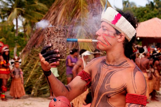 santa cruz cabralia, bahia / brazil - april 17, 2010: indians of the pataxo ethnic group are seen during indigenous games in the Coroa Vermelha village in the city of Santa Cruz Cabralia, in southern Bahia.
