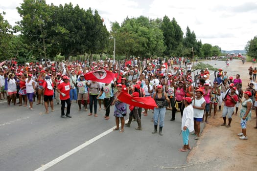 eunapolis, bahia / brazil - march 1, 29011: women from the Landless Movement - MST - are seen during a protest blocking the BR 101 highway in the city of Eunapolis...