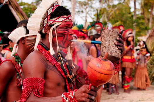 santa cruz cabralia, bahia / brazil - april 17, 2010: indians of the pataxo ethnic group are seen during indigenous games in the Coroa Vermelha village in the city of Santa Cruz Cabralia, in southern Bahia.