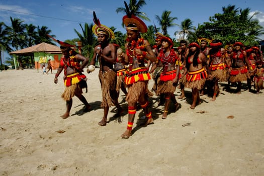 santa cruz cabralia, bahia / brazil - april 17, 2011: indians of the pataxo ethnic group are seen during indigenous games in the Coroa Vermelha village in the city of Santa Cruz Cabralia, in southern Bahia.
