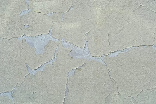 Cracked paint at house wall
