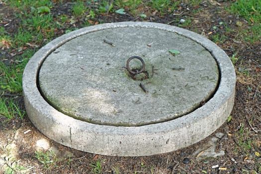 Concrete lid at septic tank reservoir