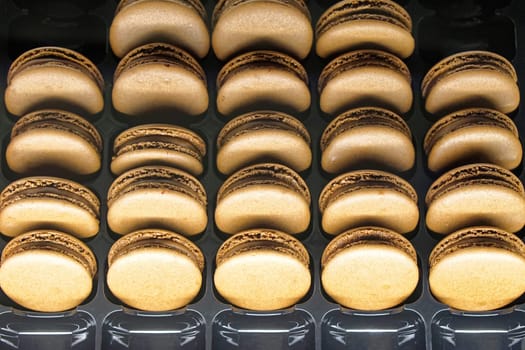 Stack of French chocolate macaroons cookies