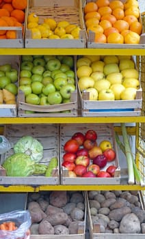 Crates with fresh fruits and vegetables