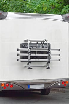 Bicycle carrier at back of camper van