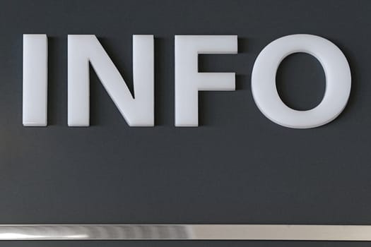White 3d plastic letters info at wall