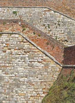 Bricks and stone walls at medieval castle