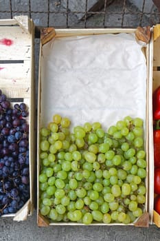 White grapes in wooden crate