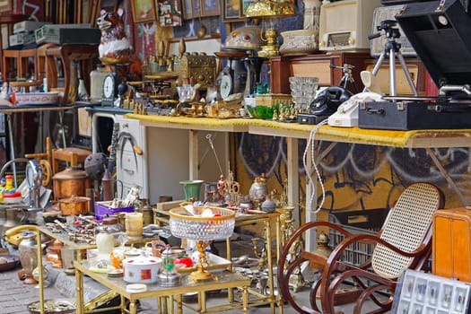 Various antique objects for sale at flea market