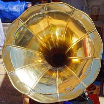 Speaker golden horn at antique vintage gramophone