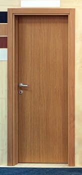 Brown veneer wood door in home interior