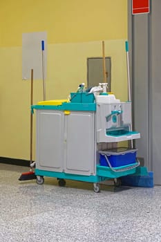 Janiorial cart loaded with cleaning equipment