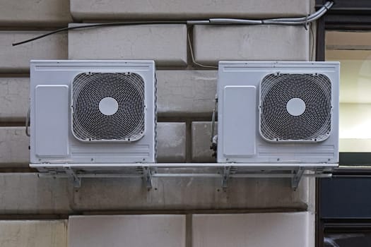 Two external air conditioner device units