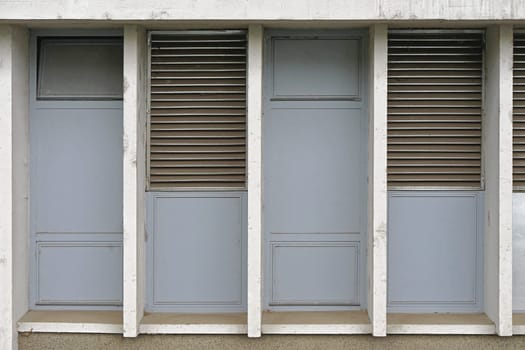 Ventilation exhaust grille at building exterior
