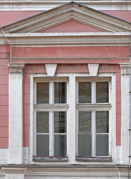 Two windows at classic style building