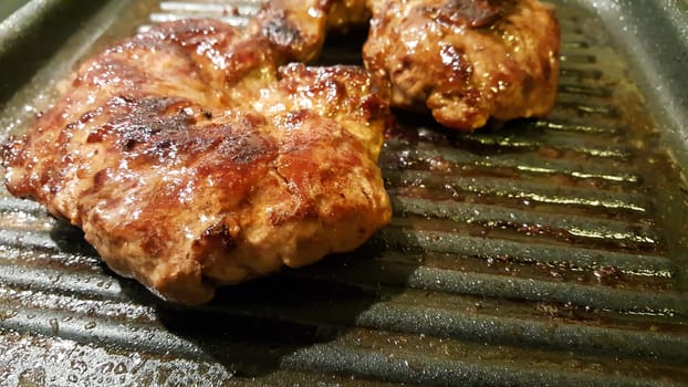 good Tasty grilled meat on a grill plate