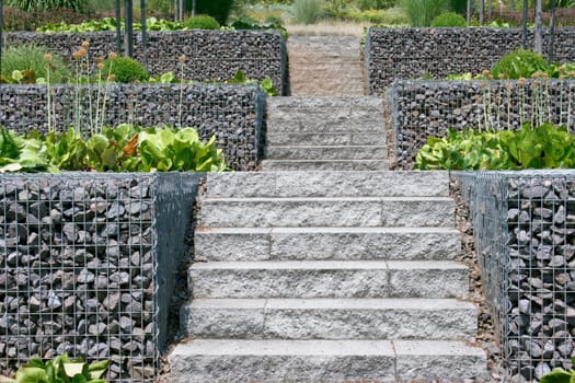 A straight running stone staircase .