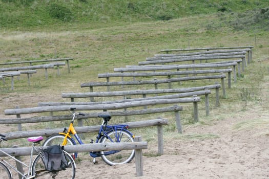 Bicycle parking wooden beams, in the dunes.