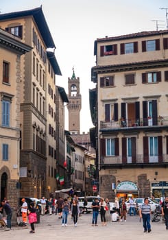 Florence, Italy, September 20, 2015: View of the Arnolfo’s tower of Palazzo Vecchio from Piazza di Santa Croce in Florence, Italy