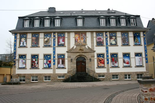 a historical old building decorated for Christmas.