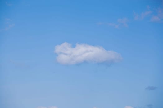 Low Angle View Of Clouds In Blue Sky.
