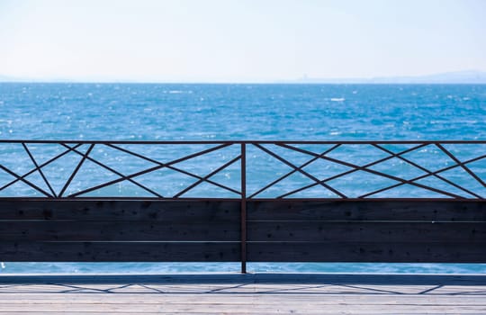 Scenic View Of Sea Against Blue Sky