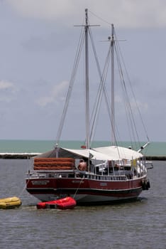 porto Seguro, bahia / brazil - june 9, 2014: schooner is seen at the mouth of the river Buranhem in the city of Porto Seguro, in southern Bahia.
