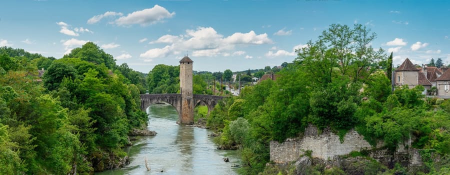 a medieval bridge over river Gave de Pau in Orthez - France