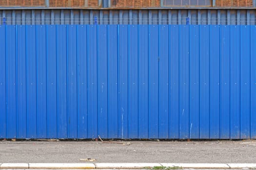 Corrugated steel metal blue fence exterior