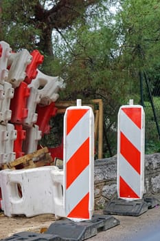 Traffic sign safety barriers at road works site