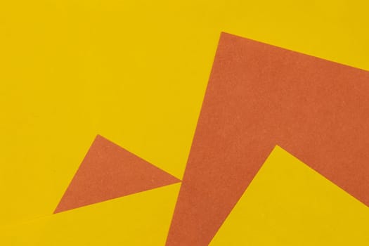 Yellow and Orange coloured paper background, abstract contrast conceptual image
