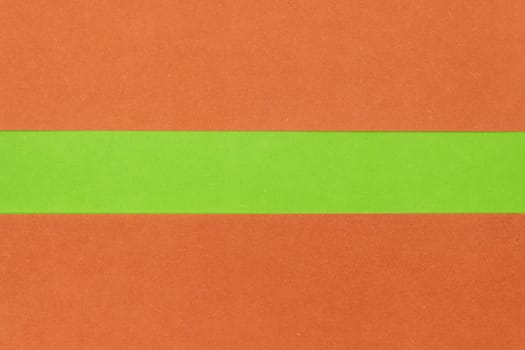 Green and Orange coloured paper background, abstract contrast conceptual image