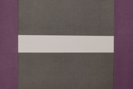 White, Grey and Purple coloured paper background, abstract contrast conceptual image