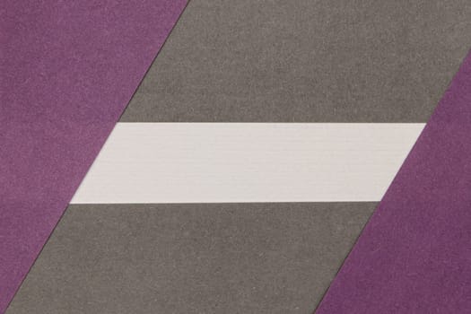 White, Grey and Purple coloured paper background, abstract contrast conceptual image